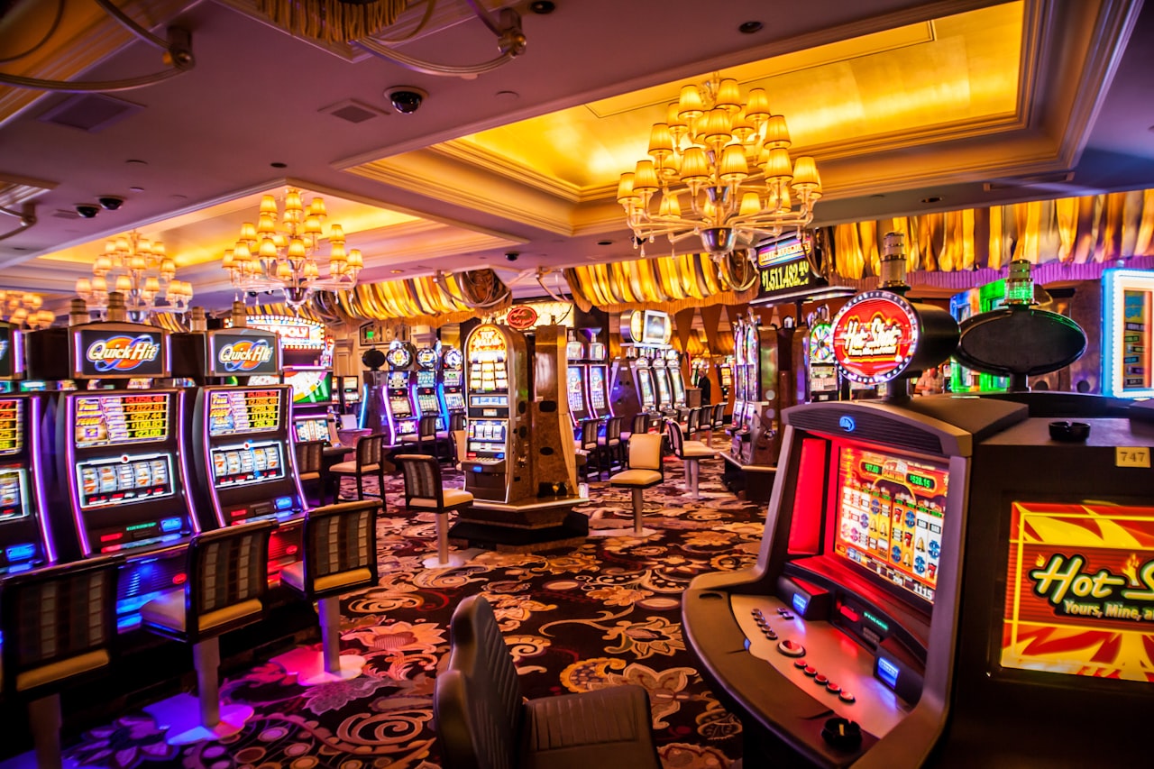 Luxurious VIP casino resort lobby lounge with glowing lights and lush green plants